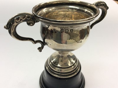 Lot 730 - Set six silver Royal Commemorative teaspoons in fitted case and small silver two handled trophy on stand