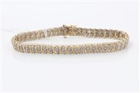 Lot 1607 - Gold (9ct) diamond set bracelet with yellow...