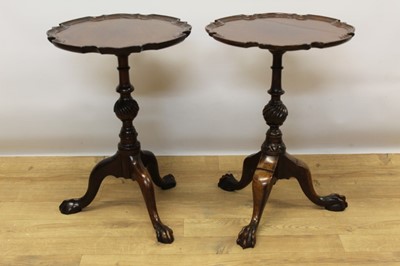 Lot 1435 - Near pair of Georgian revival pie-crust rim wine tables