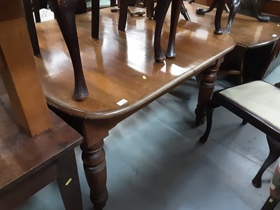 Lot 1134 - Victorian mahogany dining table with extra leaf on turned legs, together with six Queen Anne style chairs