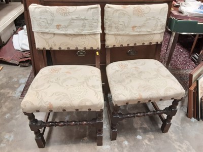 Lot 1138 - Set of four oak dining chairs with studded cream upholstered seats and backs on turned and block legs joined by turned strecher