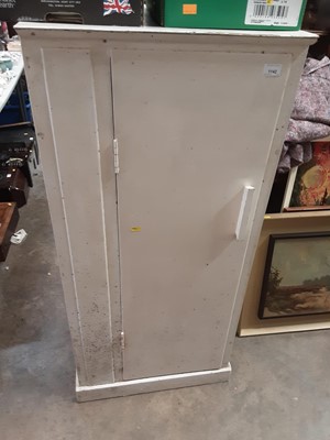 Lot 1047 - Old white painted cupboard with shelved interior enclosed by door, 57cm wide, 50cm deep, 123cm high