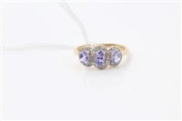 Lot 1614 - Gold (9ct) tanzanite and diamond ring with...