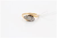 Lot 1615 - Gold (18ct) diamond three stone ring in...