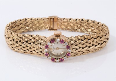 Lot 630 - 1950s/60s Beuche-Girod gold cocktail watch, the bezel set with diamonds and rubies