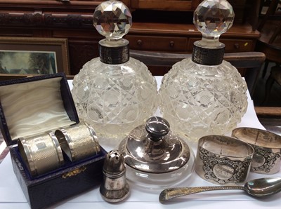 Lot 741 - Pair silver collared glass perfume bottles, silver topped glass powder pot, two pairs silver napkin rings, silver teaspoon and pepperette