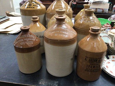 Lot 168 - Collection of nine stoneware flagons, most with Ipswich labels