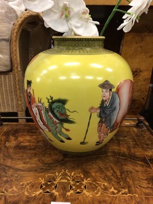 Lot 257 - Large Chinese porcelain jar, painted with figures and calligraphy on a yellow ground, 32cm high