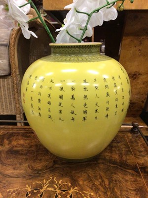 Lot 257 - Large Chinese porcelain jar, painted with figures and calligraphy on a yellow ground, 32cm high