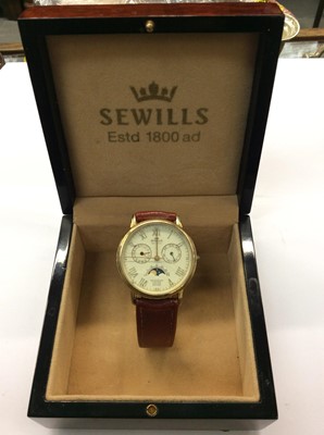 Lot 754 - Sewills Millenium limited edition 9ct gold cased wristwatch on brown leather strap, boxed