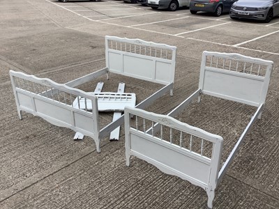 Lot 1188 - White painted double bed with spindle decoration, and a pair of matching single beds