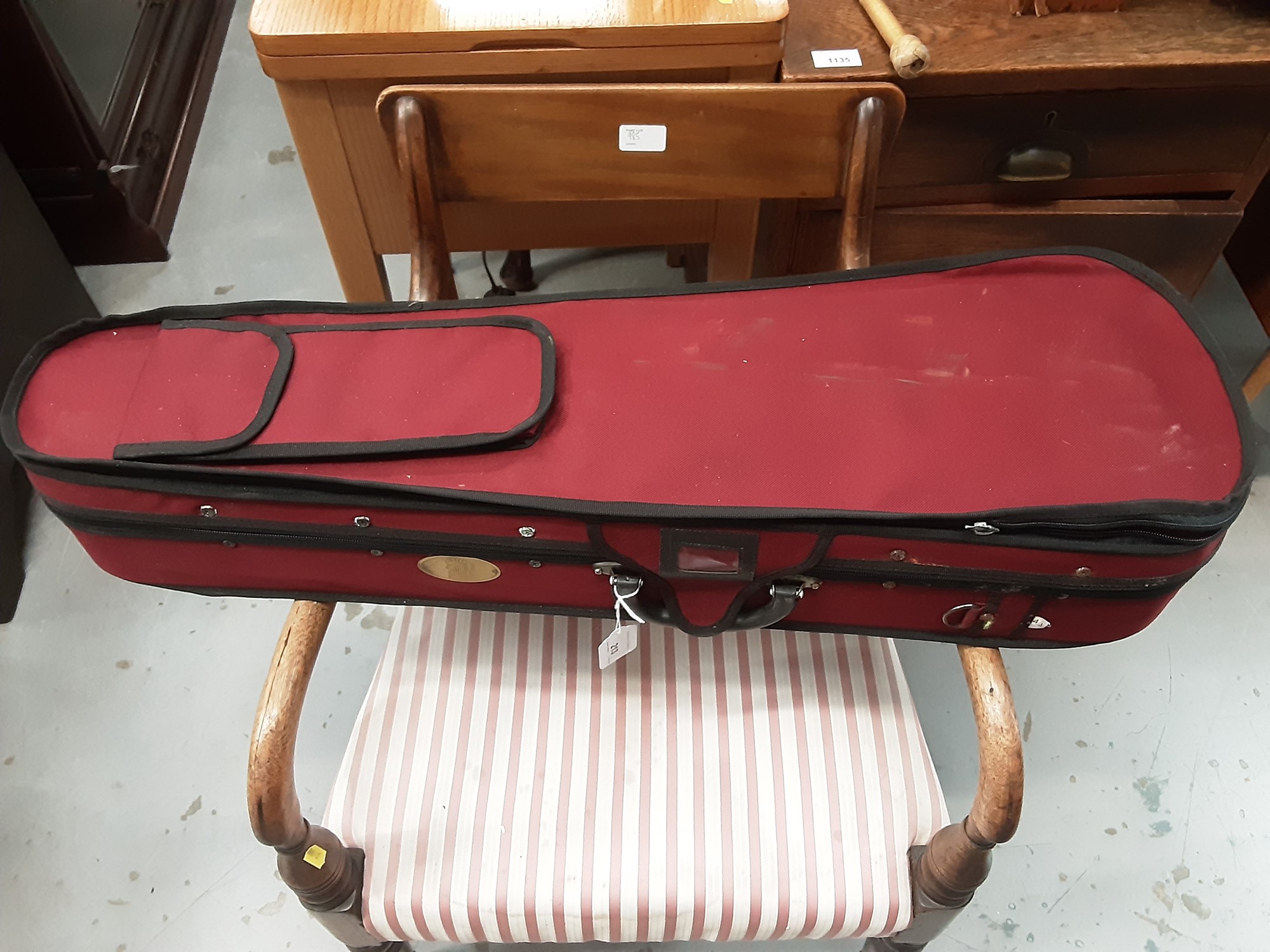 Lot 213 Violin case and a bow