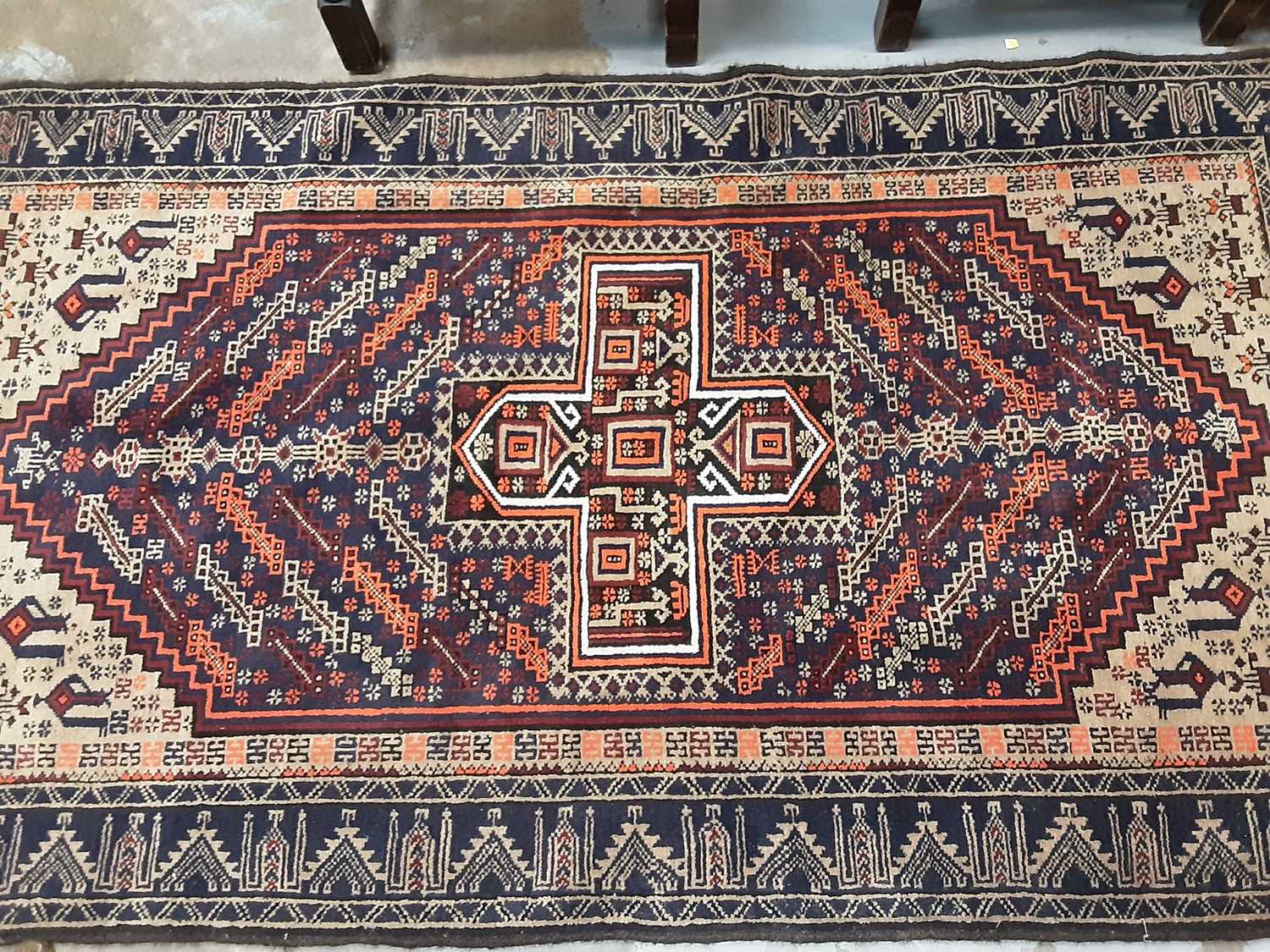 Lot 1197 - Eastern rug with geometric decoration on