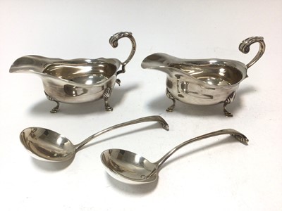 Lot 335 - Pair of George V silver of sauce boats with a pair of Victorian silver sauce ladles