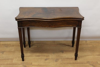 Lot 1416 - George III style mahogany serpentine card table