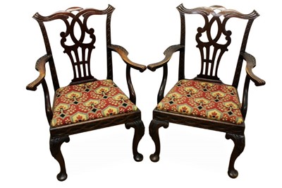 Lot 1411 - A pair of mahogany open armchairs, with needlework seats