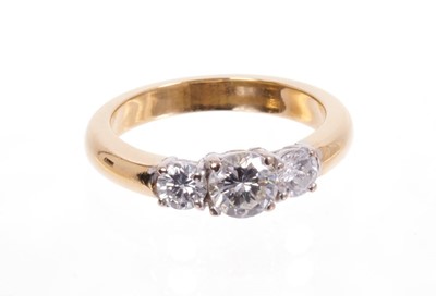 Lot 556 - Diamond three stone ring