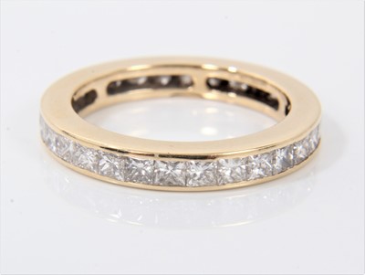 Lot 557 - Princess cut diamond full band eternity ring