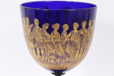 Lot 320 - A large 19th century Bristol blue glass goblet, decorated in tooled gilt with a continuing band of classical figures