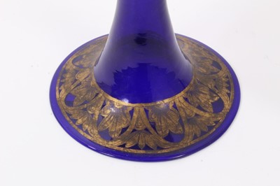 Lot 133 - A large 19th century Bristol blue glass goblet, decorated in tooled gilt with a continuing band of classical figures