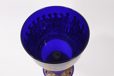 Lot 133 - A large 19th century Bristol blue glass goblet, decorated in tooled gilt with a continuing band of classical figures