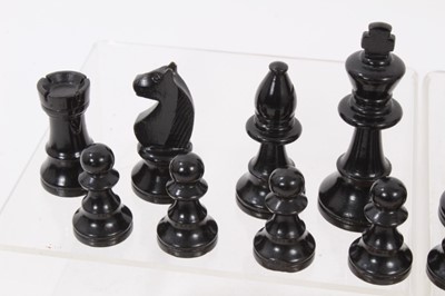 Lot 755 - Antique boxwood chess set in stained wooden box