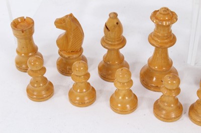 Lot 755 - Antique boxwood chess set in stained wooden box