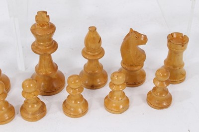 Lot 755 - Antique boxwood chess set in stained wooden box