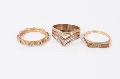 Lot 23 - 9ct gold bamboo ring, 9ct three colour gold triple band ring and one other 9ct gold ring (3)