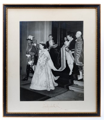 Lot 8 - H.M.Queen Elizabeth II, fine large signed Coronation day photograph of Her Majesty leaving Buckingham Palace for her Coronation with her staff including William Holloway holding her train, signed...