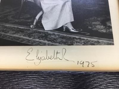 Lot 9 - H.M.Queen Elizabeth II, fine signed presentation portrait photograph of The Queen seated in Buckingham Palace , signed in ink on mount 'Elizabeth R 1975' in original leather frame with dome top wi...