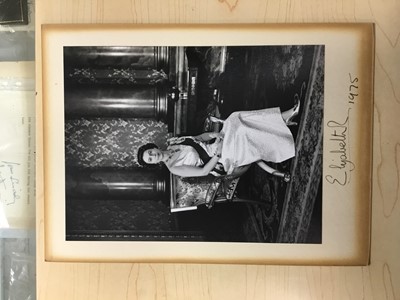 Lot 9 - H.M.Queen Elizabeth II, fine signed presentation portrait photograph of The Queen seated in Buckingham Palace , signed in ink on mount 'Elizabeth R 1975' in original leather frame with dome top wi...