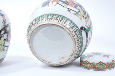 Lot 100 - Fine pair of Chinese famille verte porcelain ginger jars and covers, Kangxi (1662-1722), decorated with figural scenes and patterned borders, the covers painted with boys playing and a Ruyi border,...