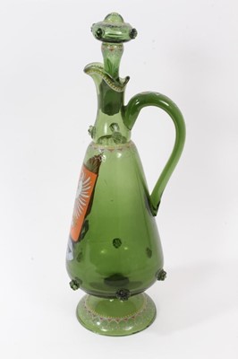 Lot 222 - Unusual Bohemian green glass decanter, enamelled with the Polish coat of arms, inscribed below and dated 1866, decorated with raspberry prunts and enamelled patterns, 38.5cm high