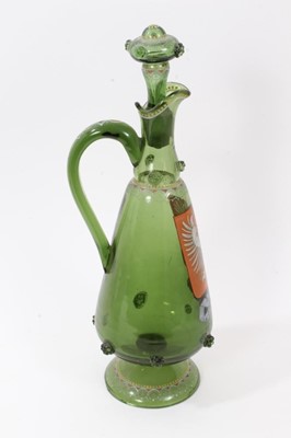 Lot 104 - Unusual Bohemian green glass decanter, enamelled with the Polish coat of arms, inscribed below and dated 1866, decorated with raspberry prunts and enamelled patterns, 38.5cm high