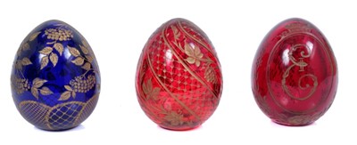 Lot 821 - Three Russian etched glass eggs