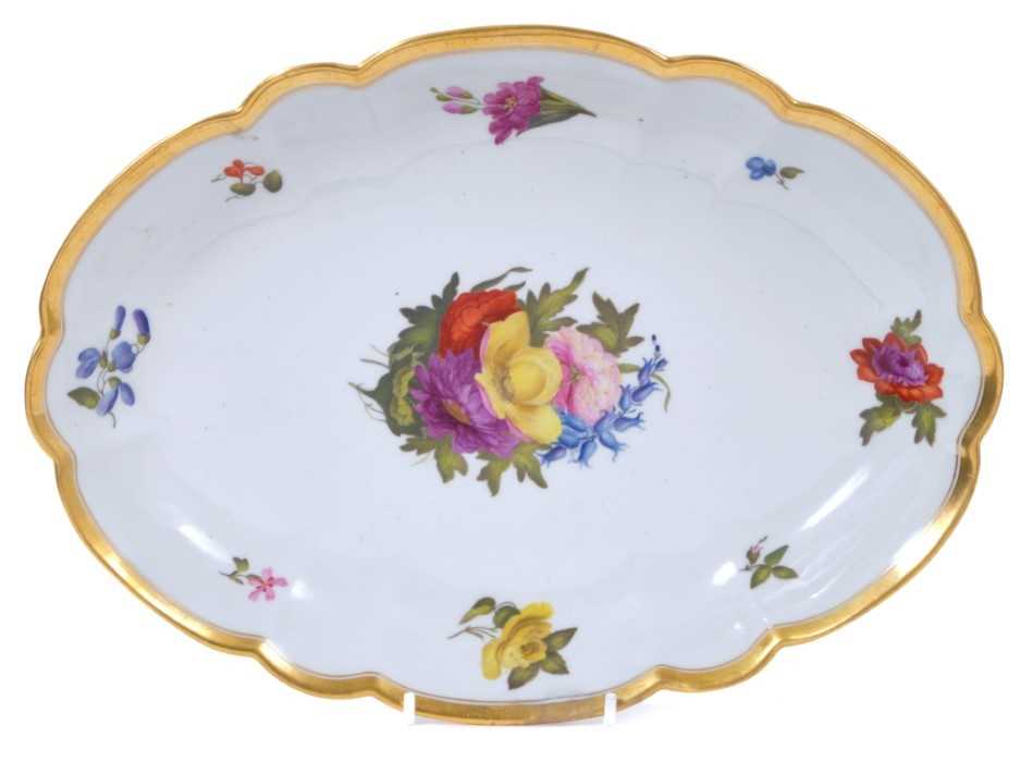 Lot 223 - Worcester Barr, Flight & Barr porcelain dish of lobed oval form, finely painted with floral sprays, probably by William Billingsley, with gilt lined rim, stamped and impressed marks to base, 28cm a...