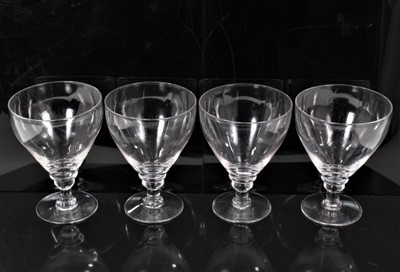 Lot 114 - Set of four 19th century glass rummers, with collared and knopped stems and conical feet, 15cm high