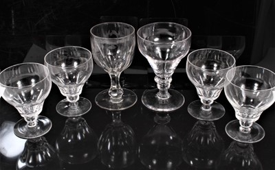 Lot 116 - Set of four 19th century glass rummers, with facet-cut ogee bowls and knopped stems, 12cm high, together with two further 19th century glasses (6)