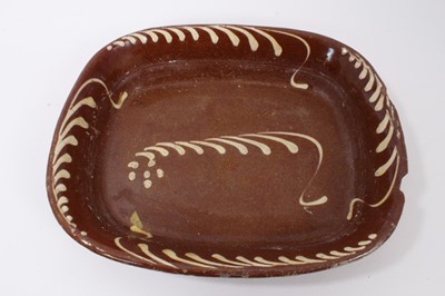 Lot 151 - 19th century Staffordshire slipware baking dish of rectangular form