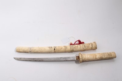 Lot 1033 - Japanese Wakizashi in ornately carved bone scabbard, blade 33.2cm in length