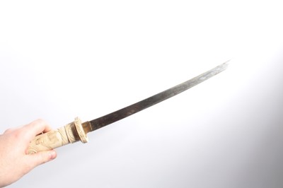Lot 1033 - Japanese Wakizashi in ornately carved bone scabbard, blade 33.2cm in length