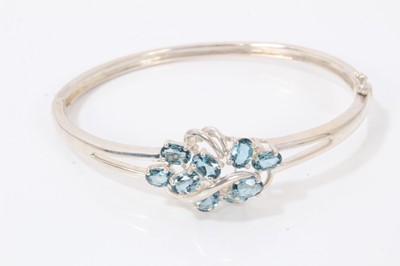 Lot 69 - Seven contemporary silver paste and gem set bangles