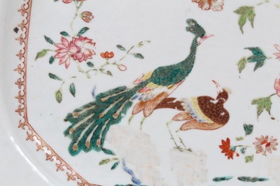 Lot 121 - Two Chinese famille rose platters, Qianlong period, painted with the double peacock pattern, 37cm across