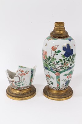 Lot 123 - Pair of Chinese famille verte porcelain vases, probably Kangxi period, converted to lamps with 19th century ormolu mounts, one in pieces