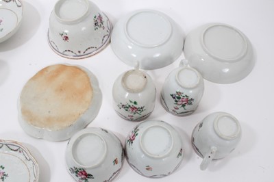 Lot 124 - Chinese famille rose tea wares, Qianlong period, including six cups, three tea bowls, four saucers, sugar bowl and two dishes, each decorated with floral sprays and swags (16)