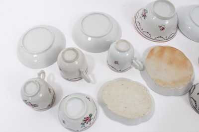 Lot 124 - Chinese famille rose tea wares, Qianlong period, including six cups, three tea bowls, four saucers, sugar bowl and two dishes, each decorated with floral sprays and swags (16)