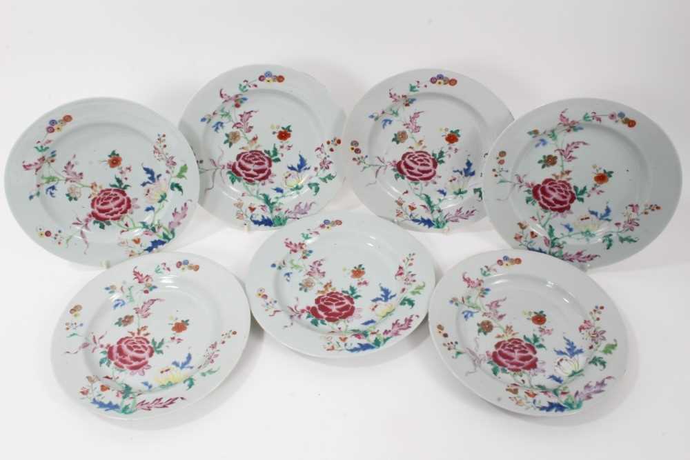 Lot 125 - Set of seven Chinese famille rose porcelain dishes, Qianlong period, decorated with peonies and other flowers, 23cm diameter