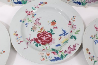 Lot 125 - Set of seven Chinese famille rose porcelain dishes, Qianlong period, decorated with peonies and other flowers, 23cm diameter