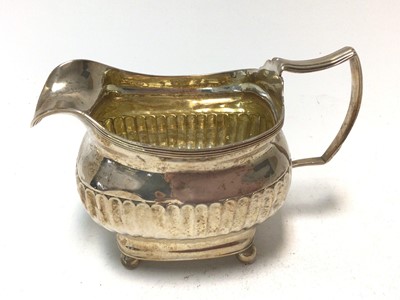 Lot 341 - George III silver cream jug of half fluted form,  (London 1811), Andrew Fogelberg.